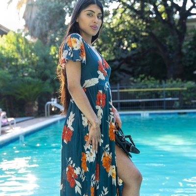 How To Choose The Right Tulum Photographer 6 women in green dress by pool - fashion pose