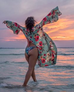 beautiful  sunset and women hands in air isla mujeres mexico